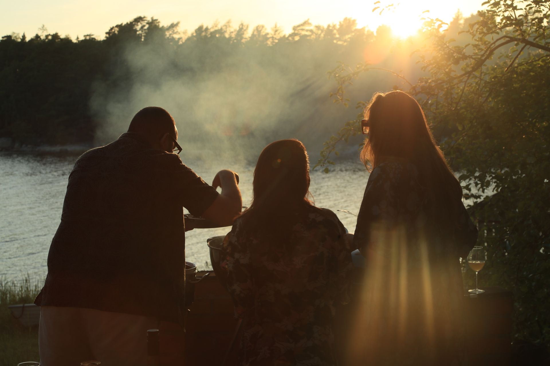 Golden hour at the grill by the water