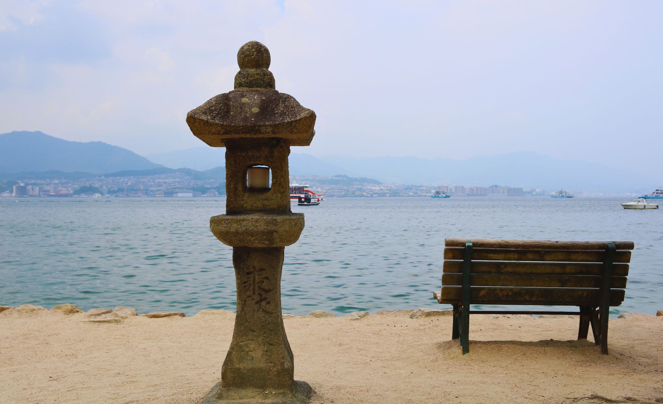 A stone lantern facing the calm Inland Sea